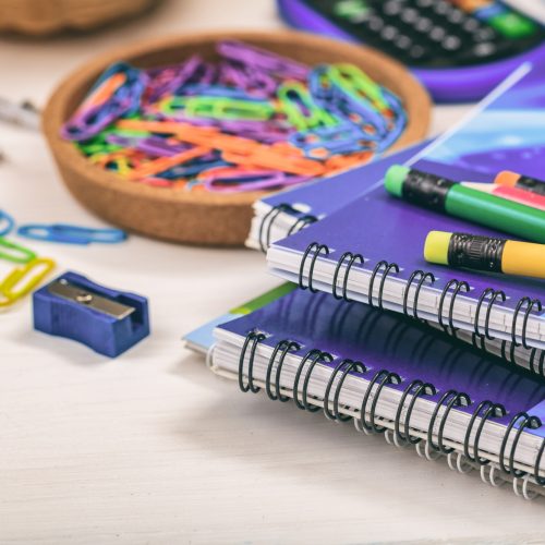 School supplies on wooden background